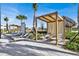 Relaxing cabanas offering shade and comfort near the pool with lounge chairs at 9179 Sommerset Hills Dr, Davenport, FL 33896
