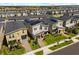 Landscaped modern home exterior in a well-kept neighborhood at 9179 Sommerset Hills Dr, Davenport, FL 33896