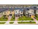 Beautiful home exterior with a well-manicured lawn and garden at 9179 Sommerset Hills Dr, Davenport, FL 33896