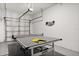 A garage with a ping pong table to have fun! at 9179 Sommerset Hills Dr, Davenport, FL 33896