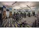 Spacious community gym with modern equipment, TV, and ample space to work out at 9179 Sommerset Hills Dr, Davenport, FL 33896
