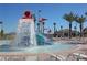 Water park feature complete with dumping bucket, water slide, and plenty of lounge seating at 9179 Sommerset Hills Dr, Davenport, FL 33896