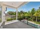 Enjoy outdoor living on this covered balcony offering privacy and overlooking the pool and lush landscaping at 9684 Sweetleaf St, Orlando, FL 32827