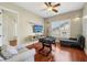 Large game room with a foosball table, a television and a comfortable lounging area at 9684 Sweetleaf St, Orlando, FL 32827
