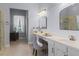Bright bathroom vanity with double sinks, makeup area, and ample counter space at 11025 Ledgement Ln, Windermere, FL 34786