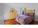 Inviting bedroom with wood floors, cozy decor and natural light at 11025 Ledgement Ln, Windermere, FL 34786