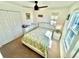 Bright and airy bedroom with ample natural light, featuring a comfortable bed and generous closet space at 1116 Myrtle Hammock Ln, Davenport, FL 33837