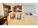 Kitchen with granite countertops, stainless steel appliances, and a breakfast bar with seating at 1116 Myrtle Hammock Ln, Davenport, FL 33837