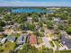 This showcases a residential area by a large lake, complete with lush greenery and well-kept properties at 1122 Vassar St, Orlando, FL 32804