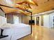 Bright and spacious bedroom featuring hardwood floors, a wood-clad ceiling, and recessed lighting at 1122 Vassar St, Orlando, FL 32804