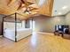 Spacious bedroom with vaulted wood ceiling, canopy bed, and lots of natural light at 1122 Vassar St, Orlando, FL 32804