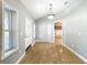 Bright foyer features hardwood floors, ample natural light, and a white front door at 1122 Vassar St, Orlando, FL 32804
