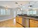 Bright kitchen with stainless appliances, granite counters, and open-concept design at 1122 Vassar St, Orlando, FL 32804