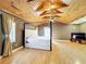 Spacious main bedroom featuring a wood ceiling with beams and a four poster bed at 1122 Vassar St, Orlando, FL 32804