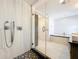 Luxurious glass-enclosed shower and soaking tub offer a spa-like experience at 1122 Vassar St, Orlando, FL 32804