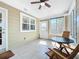 Sunny room with ceiling fan and nice lighting with table and chairs at 1122 Vassar St, Orlando, FL 32804