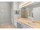 Elegant bathroom with double vanity, a large mirror, a shower stall, and a separate tub at 1151 Chessington Cir, Lake Mary, FL 32746