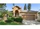 Charming single-Gathering home with a well-manicured lawn, mature trees, and an inviting front entrance at 1151 Chessington Cir, Lake Mary, FL 32746