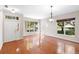 Bright living room featuring hardwood floors, natural light, and a welcoming ambiance at 1151 Chessington Cir, Lake Mary, FL 32746