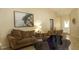 Inviting living room with comfortable seating and a warm, welcoming atmosphere at 1567 Oak Hill Trl, Kissimmee, FL 34747