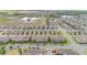 Aerial view of a large neighborhood featuring many homes and mature trees at 16261 Admirals Cove Ln, Winter Garden, FL 34787