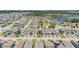 Stunning aerial view of the residential area with lakes, lush landscaping, and well-maintained homes at 16261 Admirals Cove Ln, Winter Garden, FL 34787