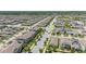 Panoramic aerial shot showcasing a large residential community with tree-lined streets and houses at 16261 Admirals Cove Ln, Winter Garden, FL 34787