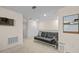 Cozy bonus room features neutral paint, carpet flooring, futon, and closet at 16261 Admirals Cove Ln, Winter Garden, FL 34787