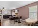 The living room features a decorative table, chairs, and a large sofa at 16261 Admirals Cove Ln, Winter Garden, FL 34787