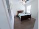 Cozy bedroom with hardwood floors, a large window and natural light at 16274 Taliesin St, Winter Garden, FL 34787