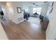 Open bonus room featuring laminate flooring, a TV, and a keyboard at 16274 Taliesin St, Winter Garden, FL 34787