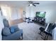 Bonus room featuring a drum set, keyboard, and comfortable seating area with an area rug at 16274 Taliesin St, Winter Garden, FL 34787