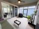 Screened-in patio with outdoor seating and a grill at 16274 Taliesin St, Winter Garden, FL 34787