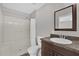 Bathroom features a shower-tub combo with curtain, toilet and vanity with sink at 1701 Smoketree Cir, Apopka, FL 32712