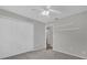 Cozy bedroom with carpet, closet, ceiling fan, and neutral paint is ready for your personal touch at 1701 Smoketree Cir, Apopka, FL 32712