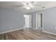 Bright bedroom with ceiling fan and access to ensuite bathroom at 17787 Sw 22Nd Ave, Ocala, FL 34473