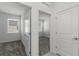 View of a hallway with two bedrooms and a bathroom at 1908 Blissful Dr, Kissimmee, FL 34744