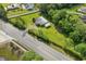 A full aerial shot of the property with a building on a green lot at 1981 N County Road 426, Oviedo, FL 32765