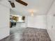 Open-concept living area showcasing modern floors and open access to the kitchen at 1981 N County Road 426, Oviedo, FL 32765