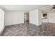 Bright living room featuring gray wood-look flooring that brings a touch of modern elegance to the space at 1981 N County Road 426, Oviedo, FL 32765