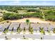 Aerial neighborhood view with manicured lawns, ponds, and beautiful Florida landscape at 2026 Key Bay Trl, Kissimmee, FL 34747