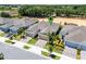 A new home construction with a two-car garage, landscaped yard, and paver driveway at 2026 Key Bay Trl, Kissimmee, FL 34747