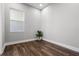 Neutral bedroom with hardwood floors, white trim and natural light at 2026 Key Bay Trl, Kissimmee, FL 34747
