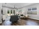 Bright and airy living room featuring hardwood floors, neutral paint, and a sliding glass doors to the outside at 2026 Key Bay Trl, Kissimmee, FL 34747