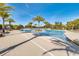 Large community pool surrounded by lounge chairs and swaying palm trees, ideal for sunny afternoons at 2026 Key Bay Trl, Kissimmee, FL 34747