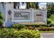Elegant community entrance sign with lush landscaping, enhancing the welcoming atmosphere at 2026 Key Bay Trl, Kissimmee, FL 34747