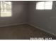 Bedroom showcasing neutral wall color and ample natural light at 21708 Royal St Georges Ln, Leesburg, FL 34748