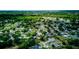 Expansive aerial view of the community showcasing beautiful tree coverage at 2729 Hilda Ct, Orlando, FL 32826