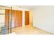 This bedroom provides natural lighting, laminate flooring, and louvred closet doors at 2729 Hilda Ct, Orlando, FL 32826