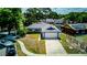 Charming single Gathering home with a well-manicured lawn and a two-car garage at 2729 Hilda Ct, Orlando, FL 32826